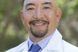 <p>Jonathan Watanabe, UCI professor of clinical pharmacy, says a new study in JAMA Network Open on drugs administered to COVID-19 patients at UC Health medical centers in 2020 reveals “how usage of certain medicines grew or declined over the course of the pandemic and how those movements were tied to evidence-based decisions being made by UC healthcare providers in real time.” Kevin Walsh / UCI</p>
