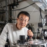 <p>Peidong Yang at a probe station in his lab at Hildebrand Hall on the UC Berkeley campus. He and his team used the device to test the photoconductivity of CGB nanowires. (Credit: Thor Swift/Berkeley Lab)</p>
 